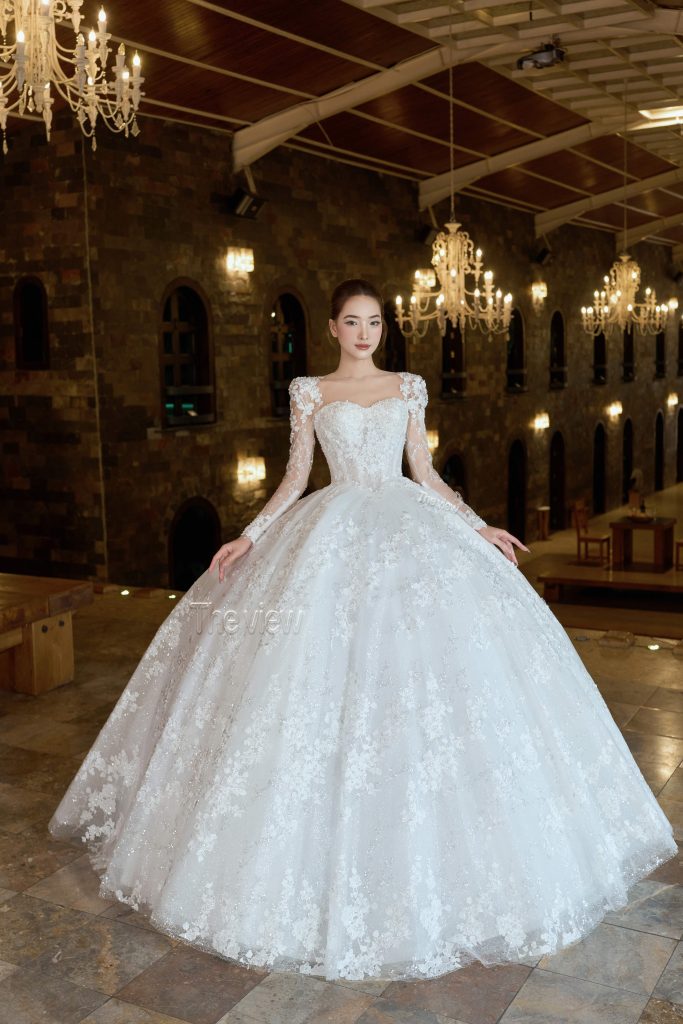 Váy cưới dài tay hở cổ chất liệu ren bling tùng xòe độn mặc cổng lễ chính 